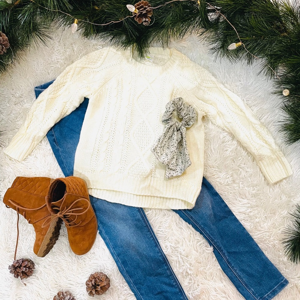 Girls’ cable knit sweater